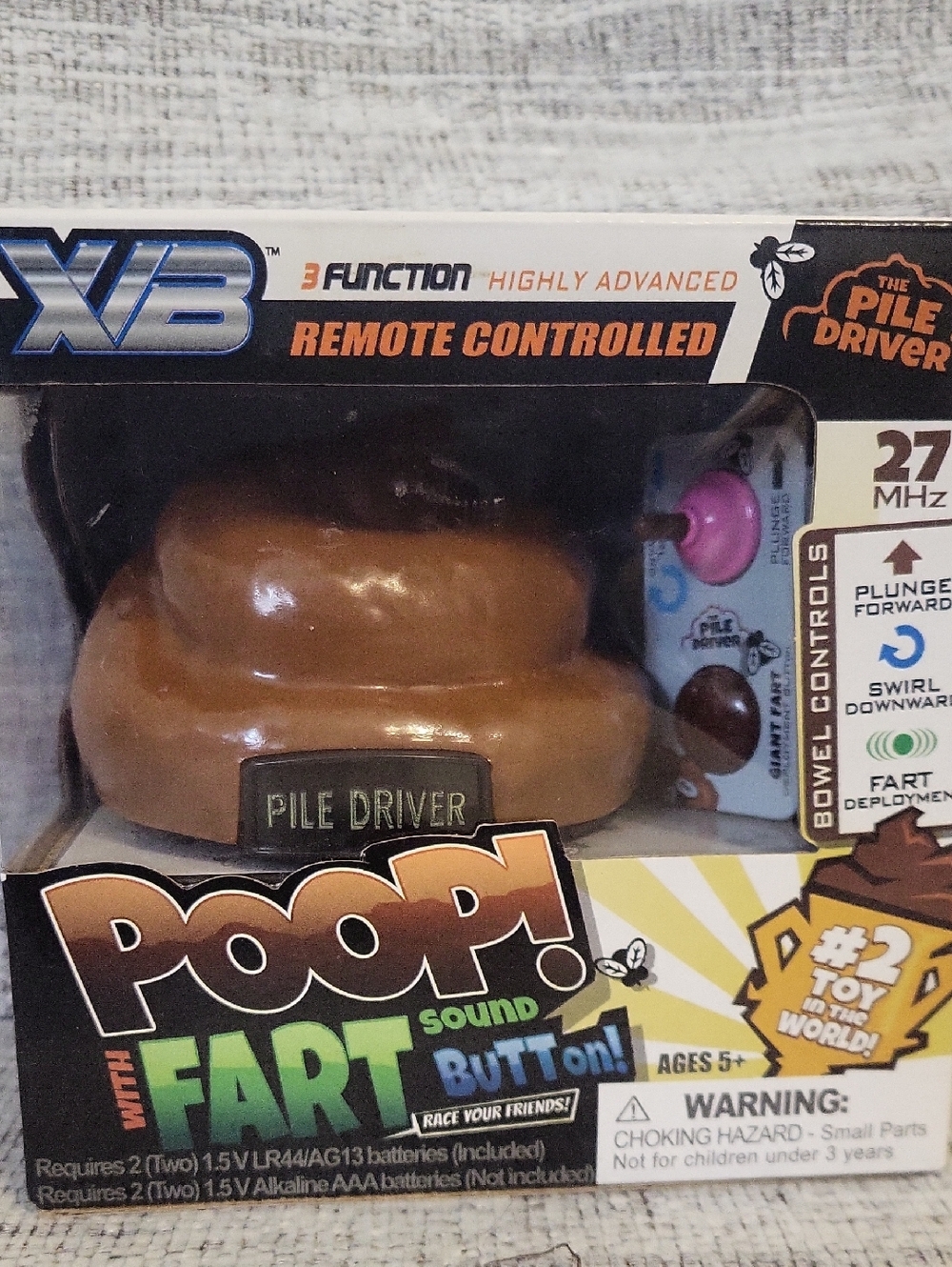 POOP! Sound Button Remote Controlled Pile Driver Toy - Brown